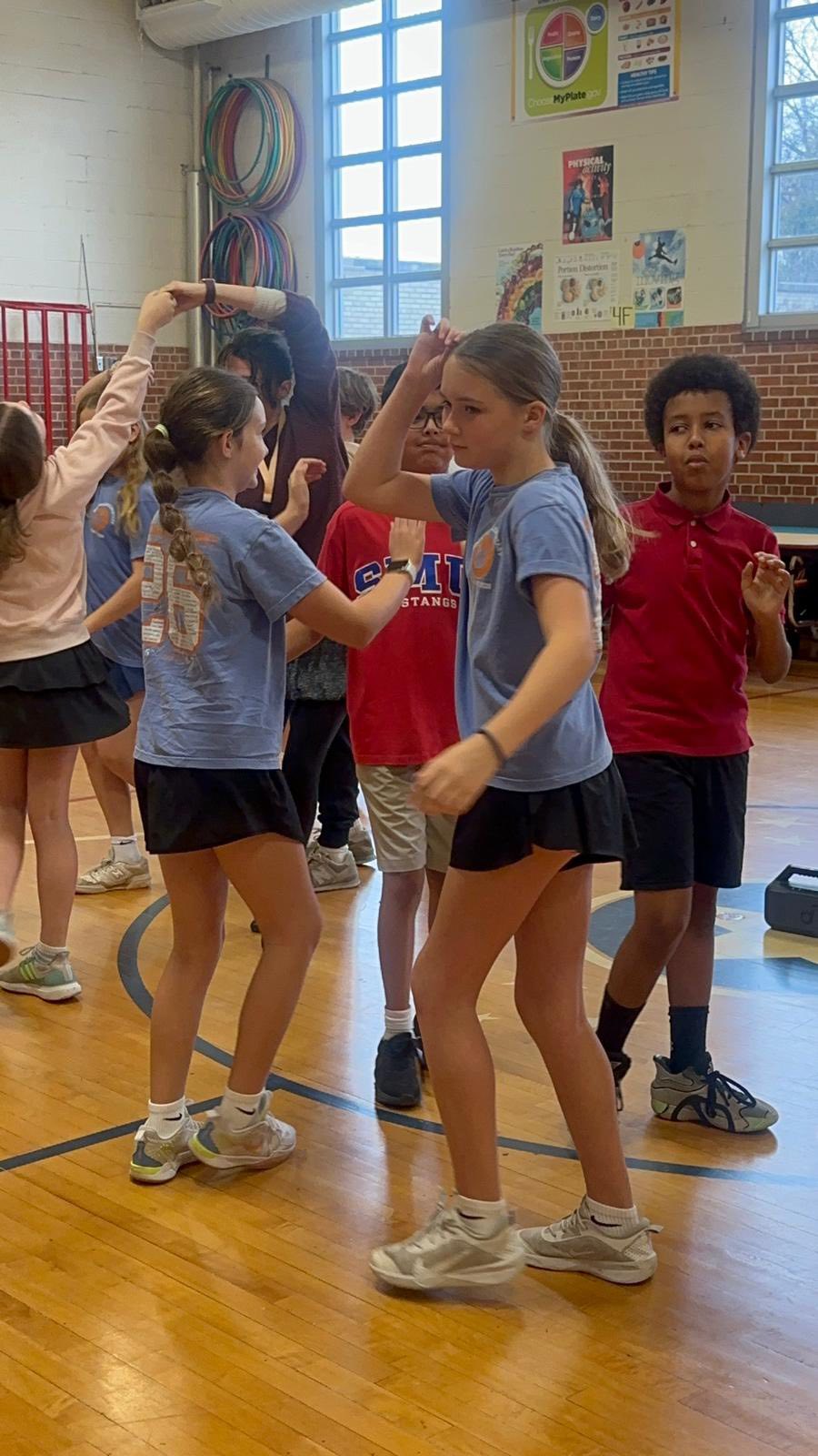 Dance to Success students practicing together